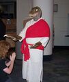 Raptor Jesus is greeted by a follower as he arrives at Dulles last Thursday.