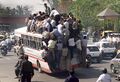 Is that some sort of clown car? No it's Indian public transport.