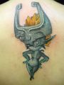 MsUmlaut also has a shitty tattoo of Midna, the fat-assed goblin from Legend of Zelda on her back.