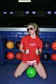 Ke$ha goes bowling.