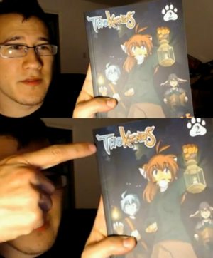 Markiplier holding furfaggot comic.png