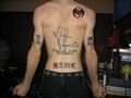 The fad of tatting Han characters on your back won't make you Japanese like this wigger thought when he combined them with some obscure rap tattoos.