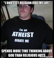 Defined by his lack of belief in God and his lack of interest in leaving the house