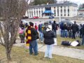 Crowd shot with church.