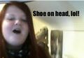 shoe on head