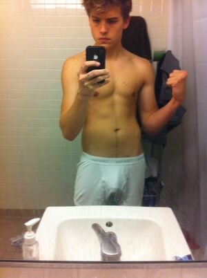 Dylan Sprouse flexing.jpg