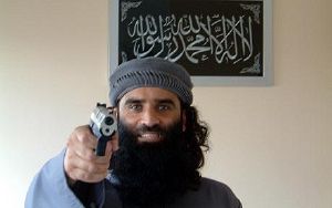 Angry muslim with gun.jpg