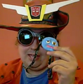 The Unknown Autobot wears his Yawning Squirtle medallion with pride, for it identifies him for the high-funcioning Autistic individual that he is.