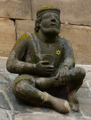 Rosheim jew gargoyle with purse.png