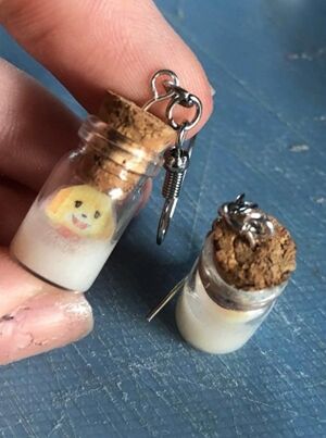 Isabelle cum jar earings.jpg