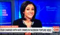 CNN 's  Sara Ganim laughs after hearing about how four niggers tortured a retarded white boy.