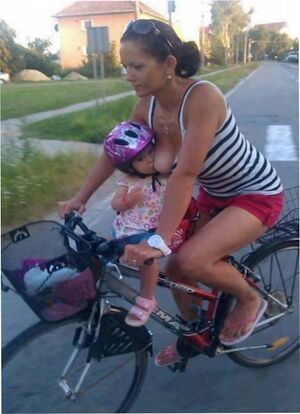 Mom riding bike with baby.jpg