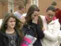 Lesbians coddle as one sneezes into her hand, the girl on far left doesn't give a fuck.