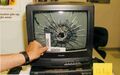 Gunshot damage to the library TV