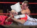 Chris Benoit showcasing his trademarked "Sleeper Hold".