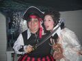 Notice that this pirate has his wench in a headlock.