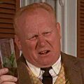 Auric Goldfinger enjoying a mint julep.