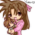 "Yuka and a Sanzo plushie n.n