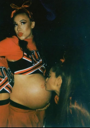Ariana kissing Colleen Ballingers fat belly.png