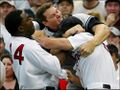 Papi and Mike Lowell getting a beat down.