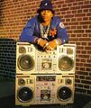 LL Cool J proudly displays his recently aquired ghetto-blasters.